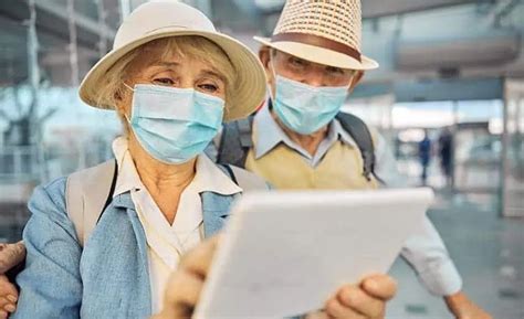 Couple In Airport Travellers Travel Medical Insurance Couple In Airport Travellers Travel Medical Insurance