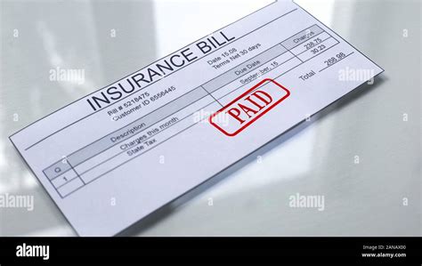 Insurance Bill Paid Seal Stamped On Document Payment For Services Insurance Bill Paid Seal Stamped On Document Payment For Services
