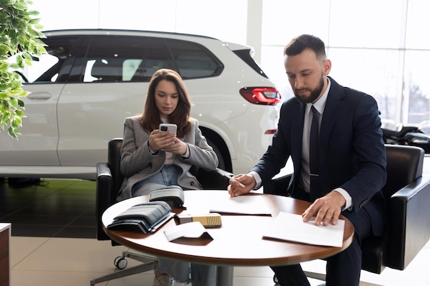 Premium Photo Process Of Buying A New Car In A Car Dealership Premium Photo Process Of Buying A New Car In A Car Dealership