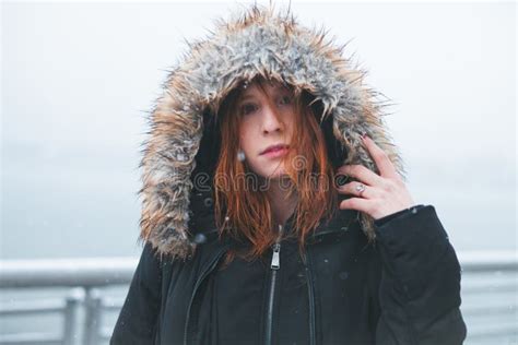 Redhead In Winter Jacket During A Snowstorm Stock Photo Image Of Redhead In Winter Jacket During A Snowstorm Stock Photo Image Of