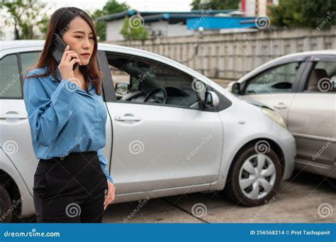Woman Drivers Call Insurance After A Car Accident Before Taking Woman Drivers Call Insurance After A Car Accident Before Taking
